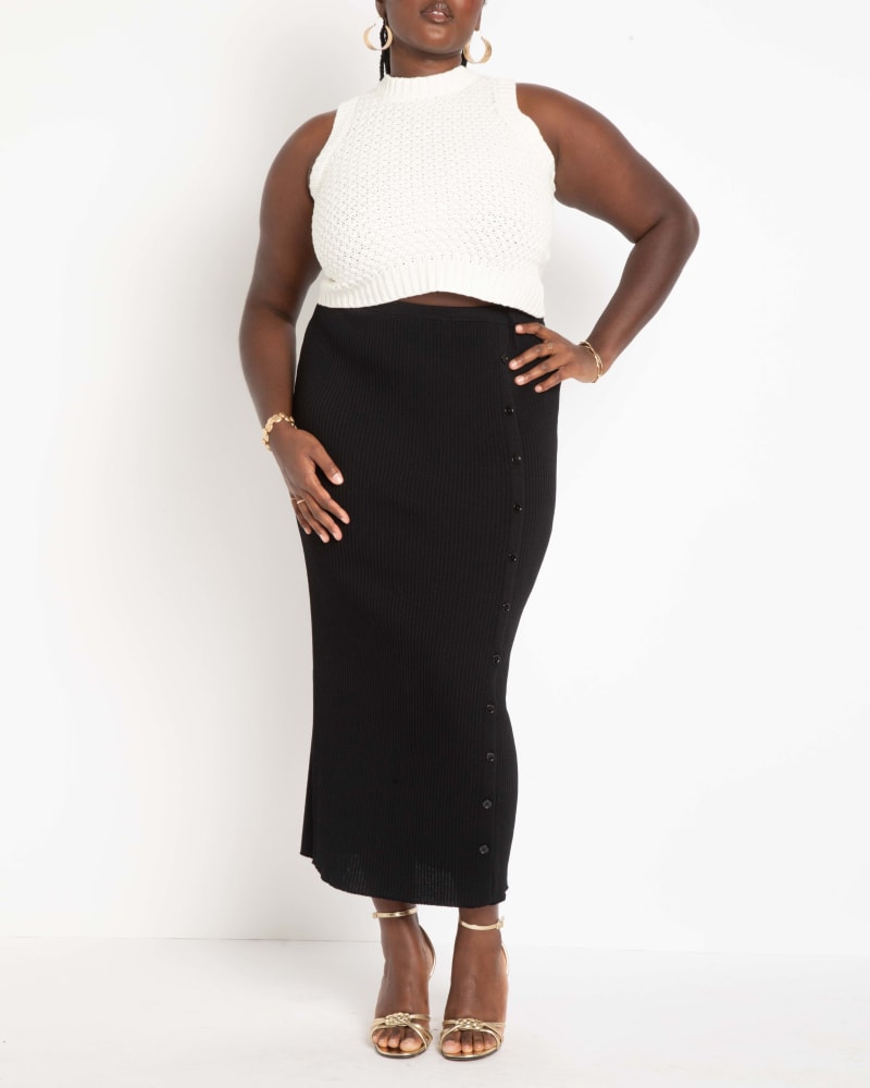 Front of a model wearing a size 22|24 Maxi Sweater Skirt with Button Down Placket in Black Onyx by ELOQUII. | dia_product_style_image_id:295422